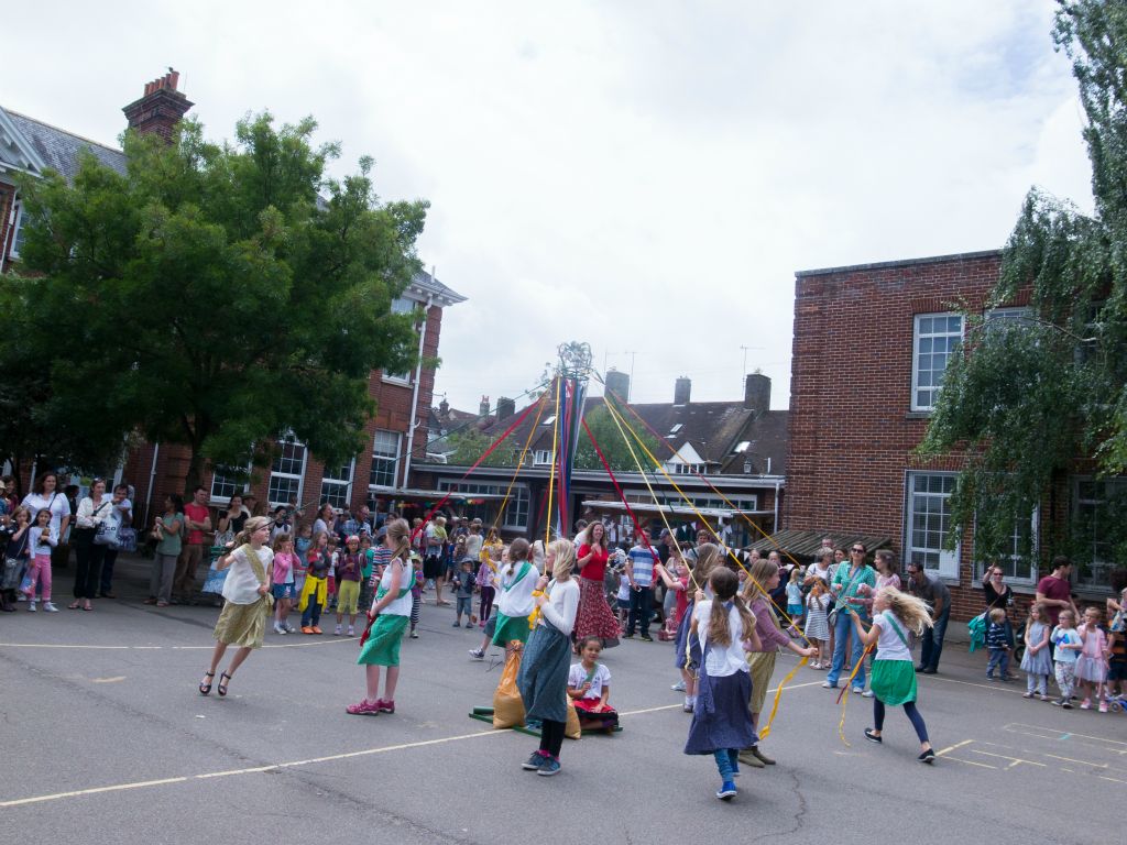 Dancing round the May Pole.