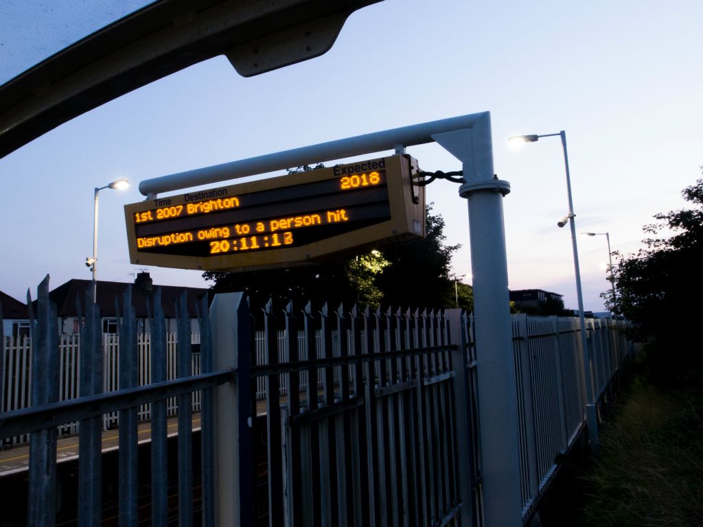 Explanation of disruption at Fishersgate Station due to a person hit.